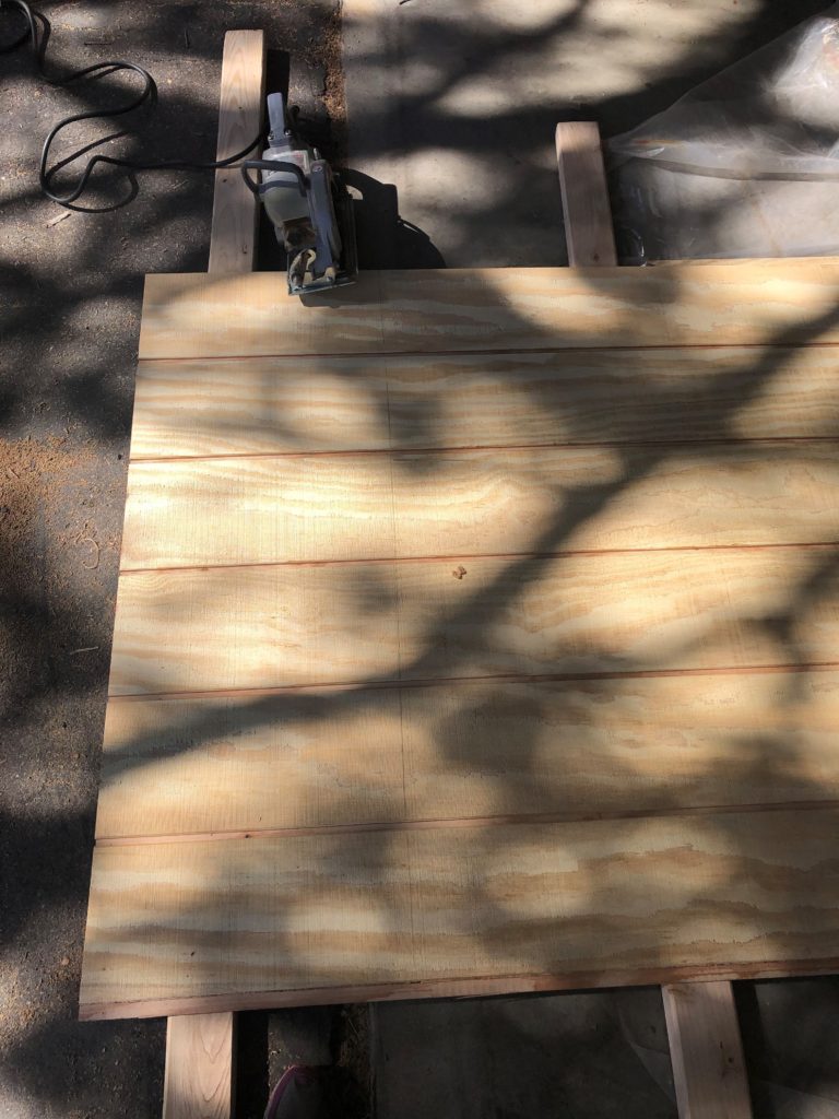 I measured (twice) and cut the siding using a circular saw